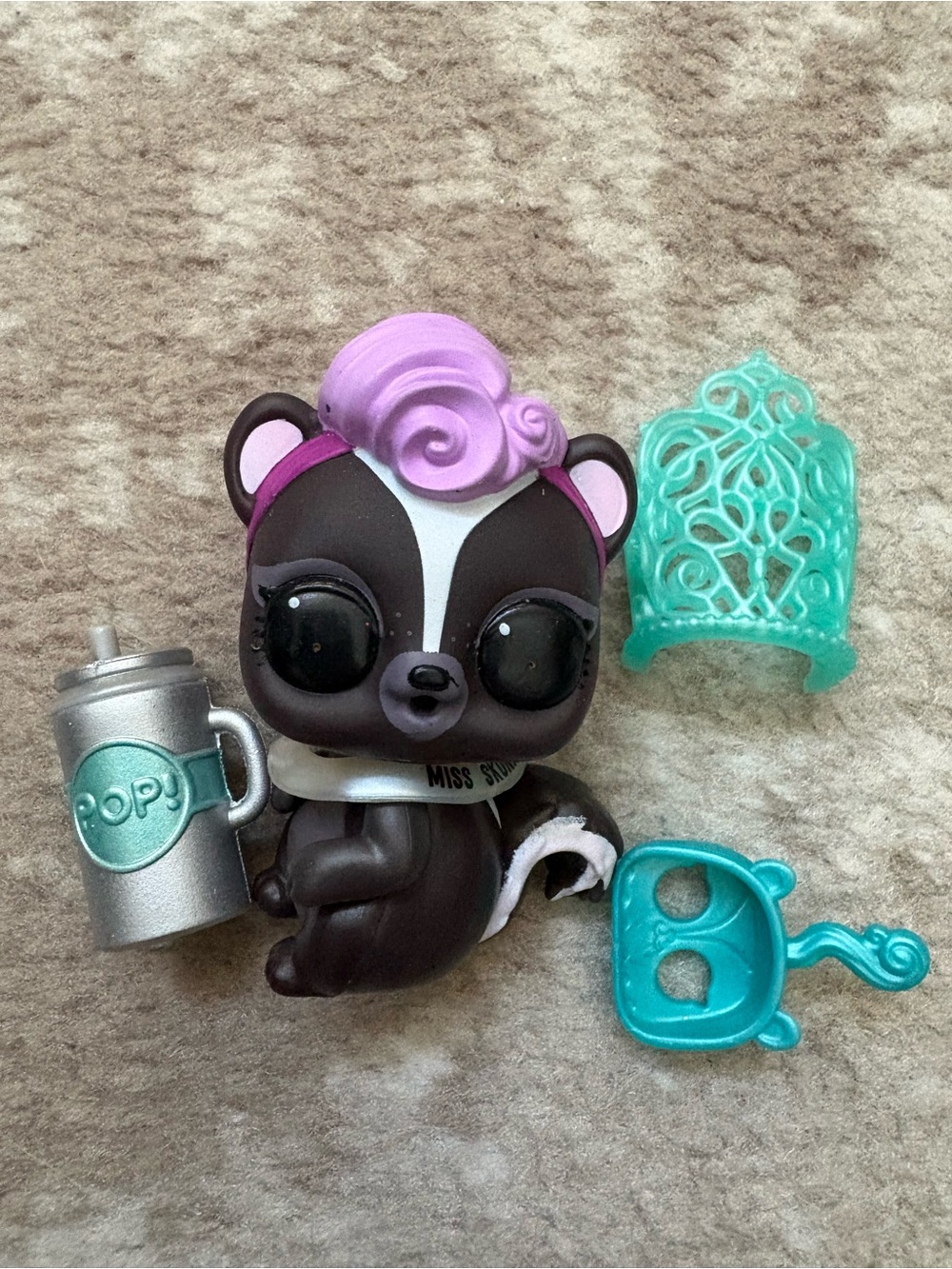 L.O.L. Surprise! Miss Skunk Figure in Black, White, Pink with Mint Accessories